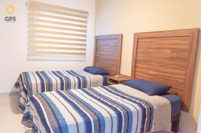 Cama o camas de una habitación en Depa en la marina a 5min de la playa by G P S rentas