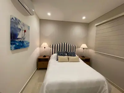 Cama o camas de una habitación en Camino al mar 2303 vista al mar