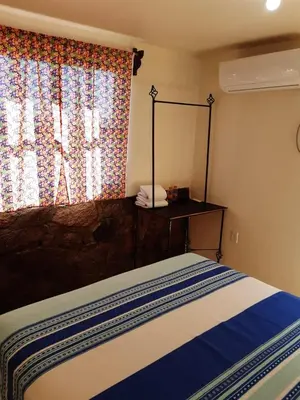Cama o camas de una habitación en Loreto La Regional