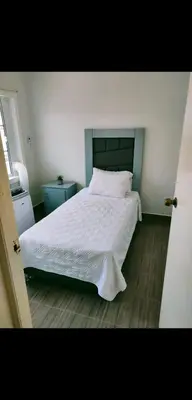 Cama o camas de una habitación en 2-bedroom apartment centrally located, near us consulate