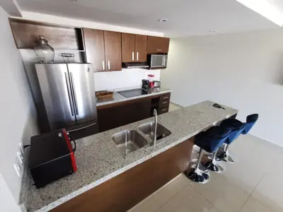Una cocina o zona de cocina en APARTAMENTO CON ALBERCA en Mazatlán