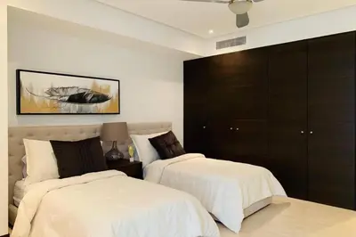 Cama o camas de una habitación en Peninsula Mzt Renta Departamentos Vacacionales p4