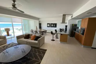 Una televisión o centro de entretenimiento en Peninsula Mzt Renta Departamentos Vacacionales p4