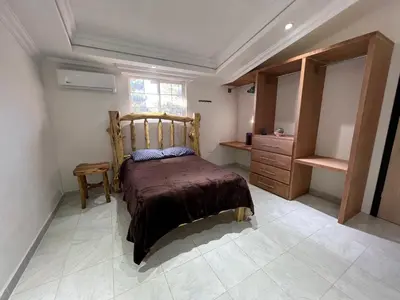 Cama o camas de una habitación en Cabañas el Pino 2