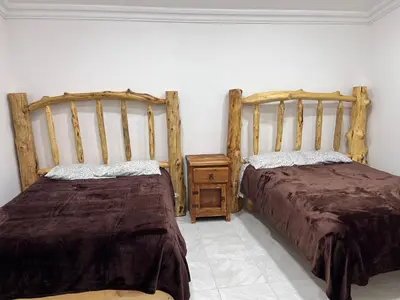 Cama o camas de una habitación en Cabañas el Pino 2