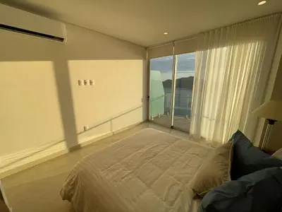 Cama o camas de una habitación en Camino al mar 2203 Vista al mar