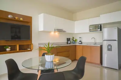Una cocina o zona de cocina en Hermoso departamento con alberca, a 10 minutos de la playa!!!