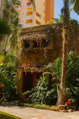 Jardín al aire libre en Villas El Rancho Green Resort
