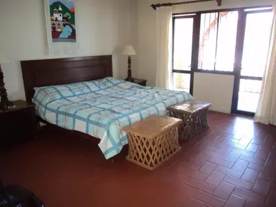 Cama o camas de una habitación en La Casa Contenta