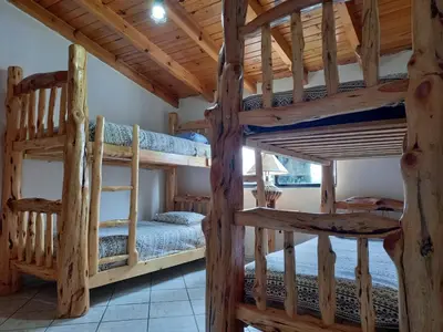 Cama o camas de una habitación en Hostal Pata de Perro