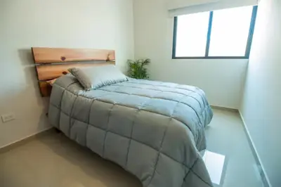 Cama o camas de una habitación en Amplio departamento Modern Boho cerca de la playa