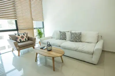 Zona de estar de Amplio departamento Modern Boho cerca de la playa