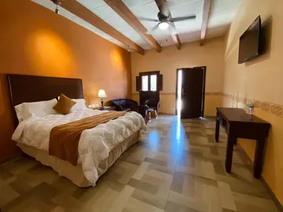 Cama o camas de una habitación en Hotel Real de los Alamos