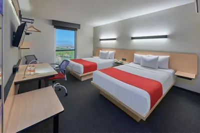 Cama o camas de una habitación en City Express by Marriott Cananea