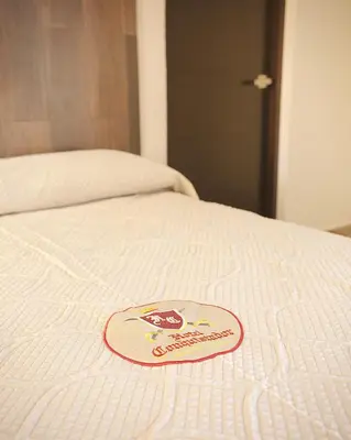 Cama o camas de una habitación en Hotel Conquistador