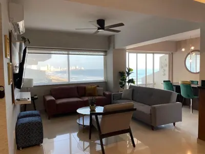 Zona de estar de a pie de playa con hermosa vista by G P S rentas