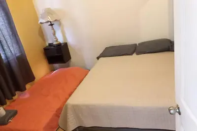 Cama o camas de una habitación en Casa completa en privada y con cochera