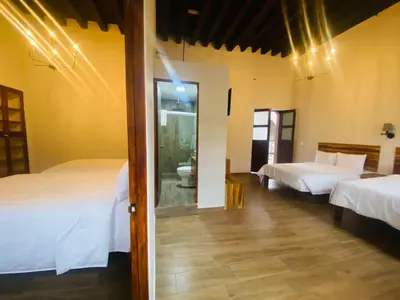 Cama o camas de una habitación en Palacio de las Rosas