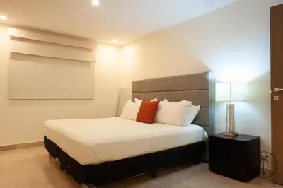 Cama o camas de una habitación en Vista a la Laguna y Amenidades Unicas