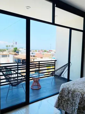 Un balcón o terraza de HERMOSO DEPARTAMENTO A UNOS PASOS DE LA PLAYA