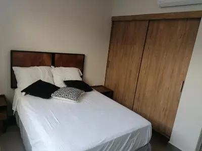 Cama o camas de una habitación en Excelente Departamento con Alberca cerca de Playa - Residencial Coto Mareta I