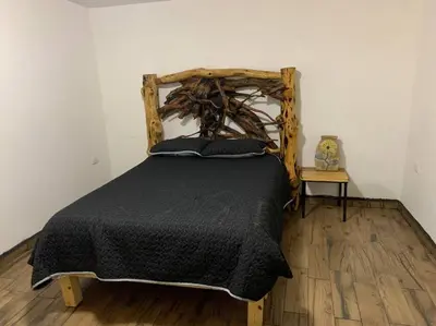Cama o camas de una habitación en Cabañas el Pino 3