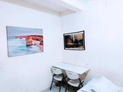 Una televisión o centro de entretenimiento en Apartamento 12 con dos camas , a 200 mts del vado del rio , cerca del centro de gobierno , internet de alta velocidad