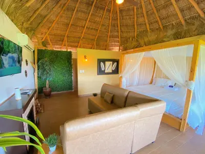 Zona de estar de Palm Valley Cabins