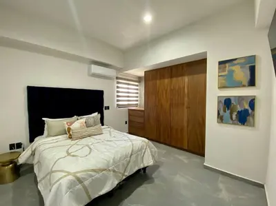 Cama o camas de una habitación en Departamento catania con vista al mar