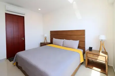 Cama o camas de una habitación en Departamento en renta en Gavias Grand Luxury