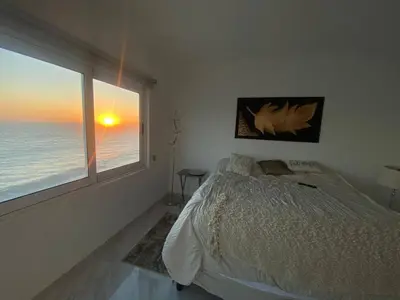 Cama o camas de una habitación en Lovely 2 bedroom oceanfront condo in Mazatlan