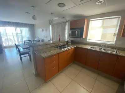 Una cocina o zona de cocina en Departamento en Costa Veleros, vista a la Marina
