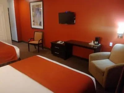 Una televisión o centro de entretenimiento en Hotel La Mina Parral
