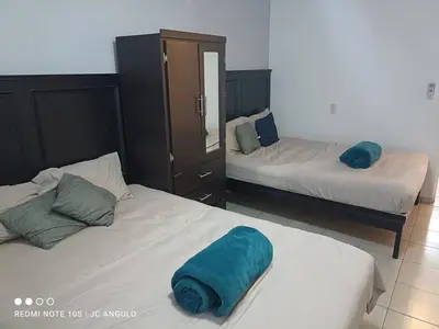 Cama o camas de una habitación en Depa sencillo, 10 min malecon