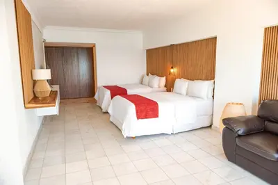 Cama o camas de una habitación en HOTEL SAN CARLOS PLAZA