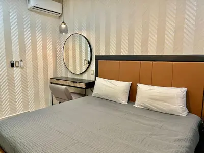 Cama o camas de una habitación en Habitación hotelera 5min de la playa by G P S rentas