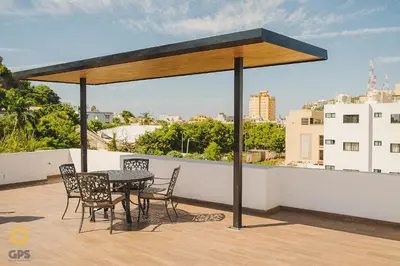 Un balcón o terraza de a unas cuadras de la plaza machado by G P S rentas