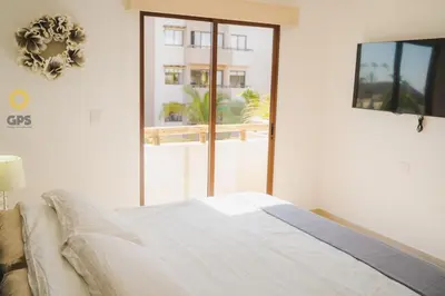 Cama o camas de una habitación en Con alberca a 5 minutos de la playa by G P S rentas