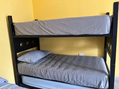 Cama o camas de una habitación en Departamento con palapa, 2 cuartos