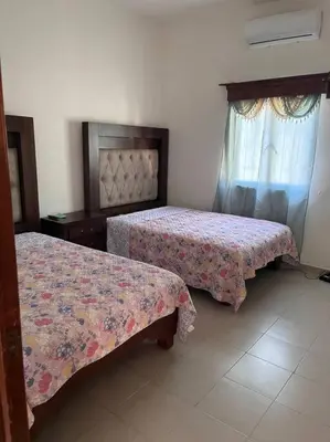 Cama o camas de una habitación en Flores Condominios Depa Lili