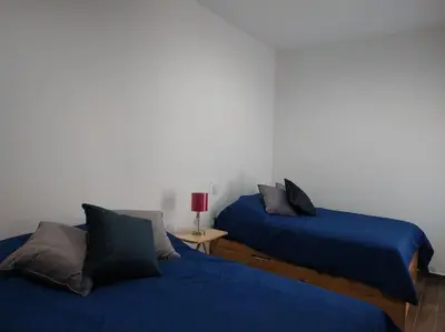 Cama o camas de una habitación en Bonito apartamento a pasos del malecón de Mazatlán