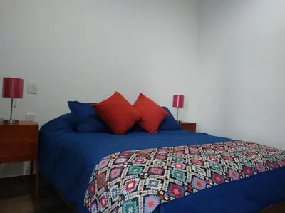 Cama o camas de una habitación en Bonito apartamento a pasos del malecón de Mazatlán