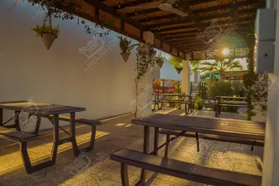 Un balcón o terraza de Planta Baja, a 10 minutos de la playa, Gran alberca y Mini Golf!!