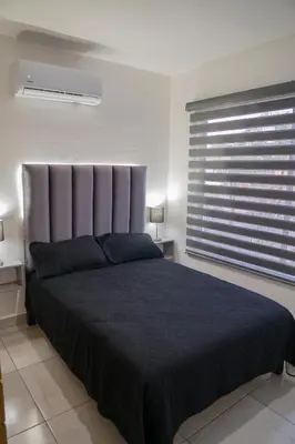 Cama o camas de una habitación en Planta Baja, a 10 minutos de la playa, Gran alberca y Mini Golf!!
