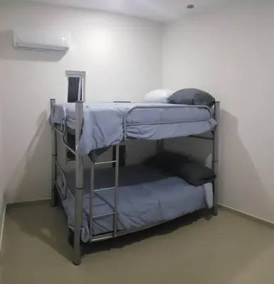 Cama o camas de una habitación en Condo Monaco en Sabalo Country