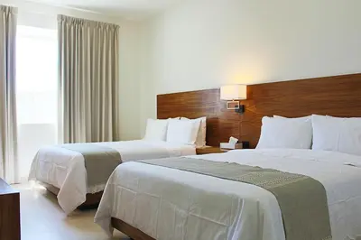 Cama o camas de una habitación en Casa Maria Boutique Hotel