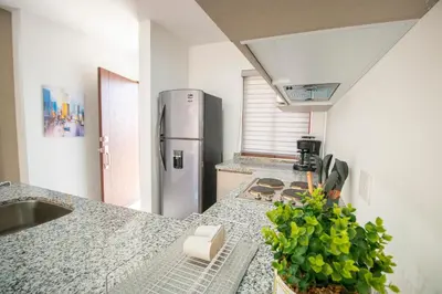 Una cocina o zona de cocina en Ambar Condominios Mazatlan