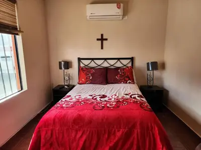 Cama o camas de una habitación en Departamento en planta baja en centro de Cananea