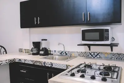 Una cocina o zona de cocina en Departamento Mazatlán