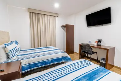 Cama o camas de una habitación en Hotel Pacific Blue Mazatlan